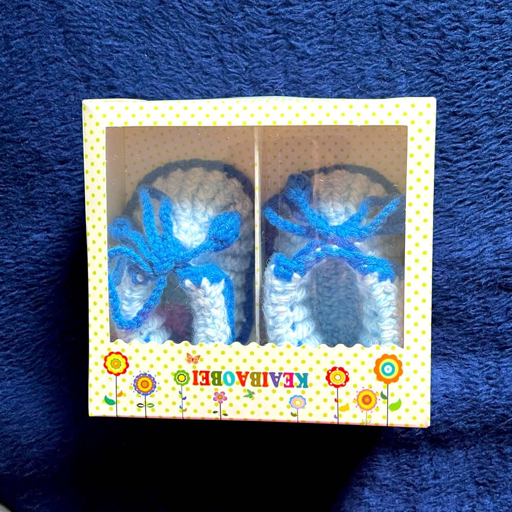 Crochet baby booties with gift box